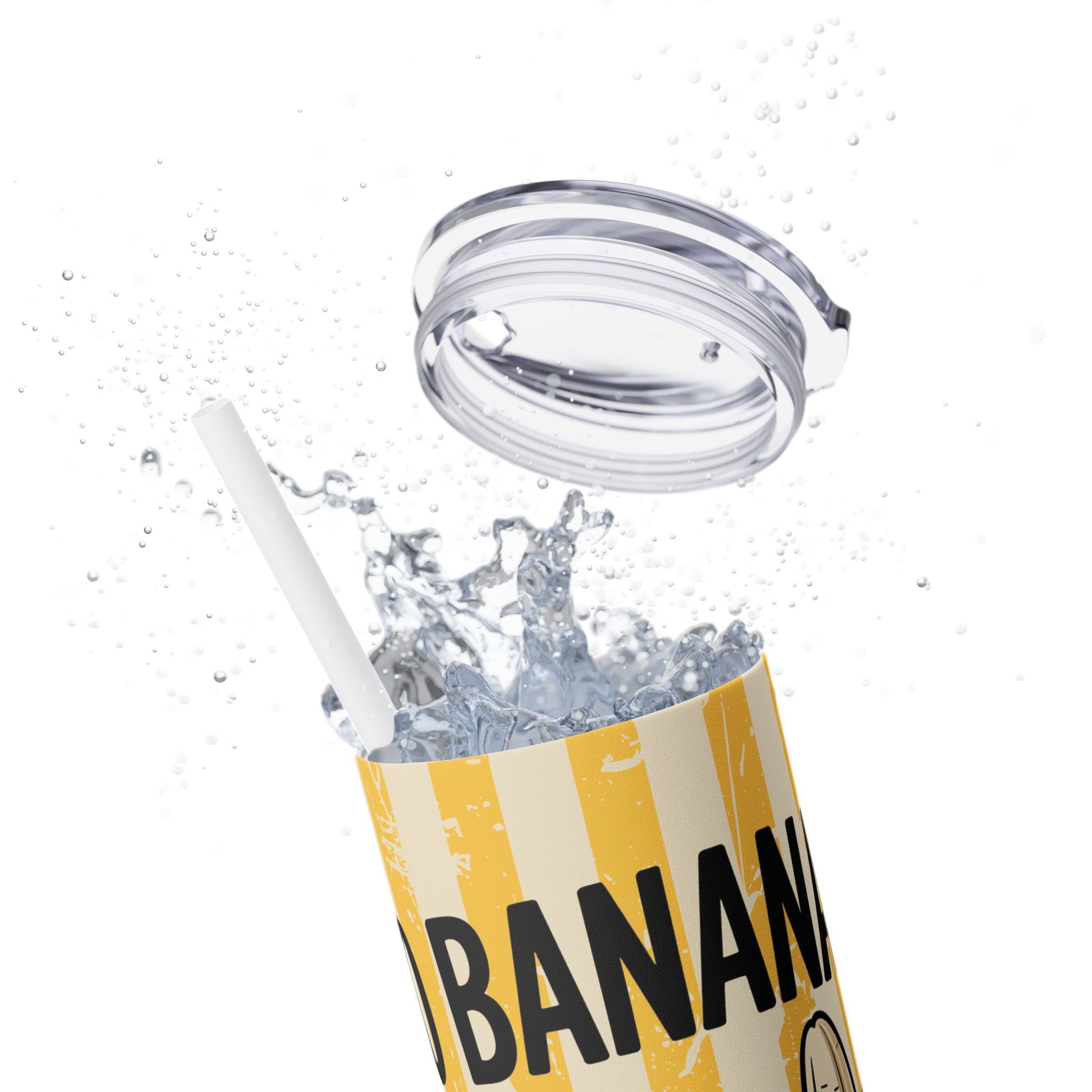 Creative splashing scene of the Banana Lover's Eco-Friendly Drinkware 20oz Skinny Tumbler with clear lid and straw, perfect for smoothies and refreshing drinks.